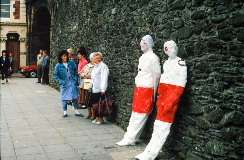 In Their Place (1986) &amp;nbsp;City walls, Derry. Nine life size figures. Re-inforced concrete, paint, reflectors, metal rings. Guildhall Square bustop figure (street theatre performance)
