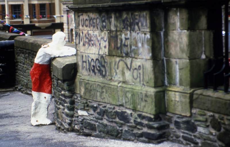 In Their Place (1986) City walls, Derry. Nine life size figures. Re-inforced concrete, paint, reflectors, metal rings. Guildhall square figure.&amp;nbsp;&amp;lsquo;&amp;hellip;This work was situated in an art practice which evolved through lived experience of the 1970&amp;rsquo;s Derry , art college in Belfast/Manchester in the late 1970s/80s and the artists&amp;rsquo;s commitment to return to Derry in the mid-80s, specifically for this proposal for a series of nine poured concrete sculptures, sited on the Derry Walls, of human figures cast from life - friends and acquaintances posed and anonymised by the artist. The artist defined In their Place as &amp;ldquo;political&amp;nbsp; and politically metaphorical in the interests of producing new knowledge&amp;nbsp; and renewed awareness of oppression&amp;rdquo; &amp;hellip;The politics of the work was determined in its materials - the concrete of the bollards used in checkpoints in the militarised city - and in the responses it received in the locality, including the &amp;ldquo;active mutilating&amp;rdquo; of one beheaded sculpture, and the alleged army bombing of another&amp;rsquo; (text extract, Four decades of Irish Sculpture, In their Place (1987) Locky Morris, Declan Sheehan, Visual Artists' News Sheet, Special Issue (2020) &amp;nbsp;
